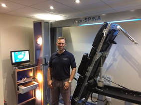 Stockwood Osteopath Adam Balderstone with IDD Therapy